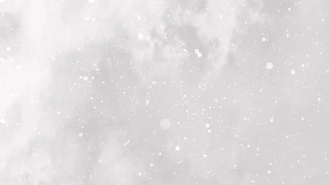 White background features tiny and larger white dots resembling snow Stock Footage 295833787