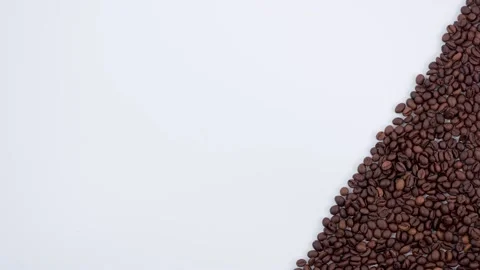 White background filled with coffee beans Stock Footage 184469177