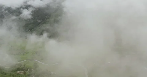 White background, flying through clouds and over mountain Stock Footage 201618008