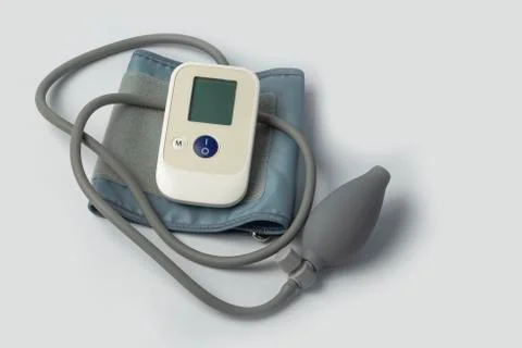 On white background. The manometer is semi-automatic for measuring blood pres Stock Photos