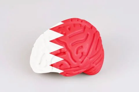 On a white background, a model of the brain with a picture of a flag - Bahrai Stock Photos