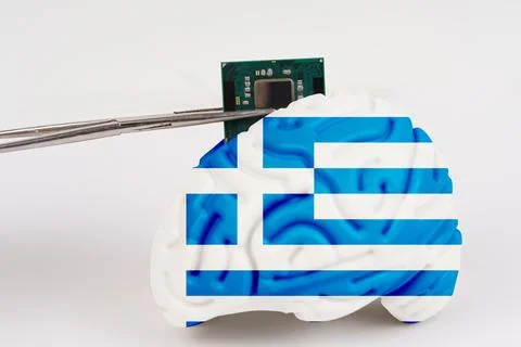 On a white background, a model of the brain with a picture of a flag - Gree.. Foto stock