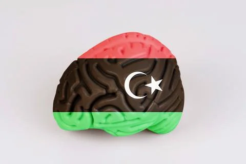 On a white background, a model of the brain with a picture of a flag - Libya Foto stock
