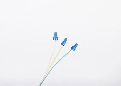 White background. pulsing light. electrical wires. terminals for insulation.  Foto stock