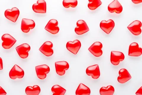 White background with red hearts pattern, flat lay, closeup Stock Photos