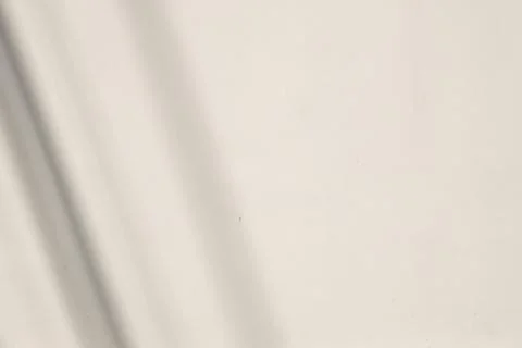 A white background with a shadow of a person on it Stock Photos