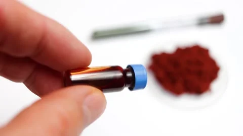 On a white background is shown the reagent for developing fingerprints Stock Footage 153982186