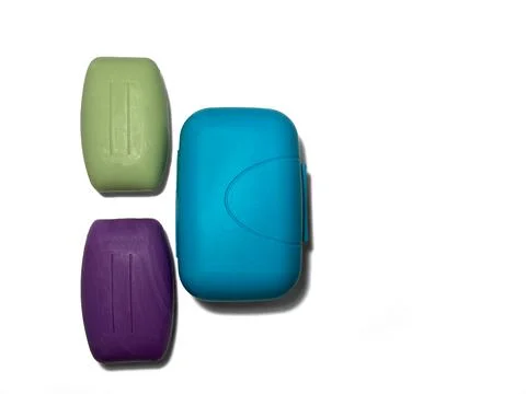 On a white background on the side are two pieces of new soap. Foto stock