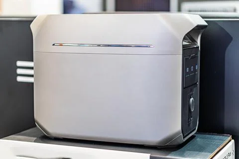 White background, silver desktop computer tower, rectangular shape, textured  Stock Photos