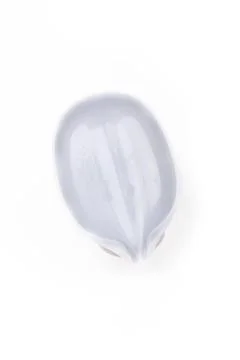 On a white background. silver soap dish, in the shape of a droplet. close-up. Stock Photos