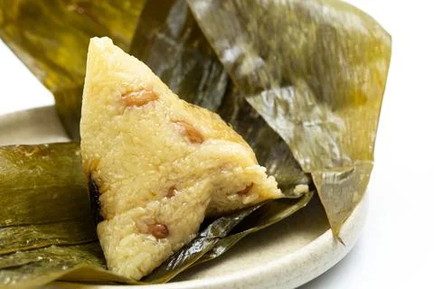 White background, table, disk, steaming hot, meat dumpling, dumpling leaves Stock Photos