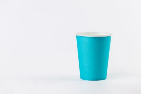 On white background two paper cups for coffee and tea painted in blue disposable 스톡 사진