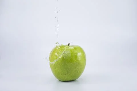 White Background with water drop in Full Depth of Field with Clipping Path. Stock Photos