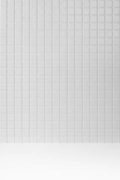 White background with white tiny tile wall, wood floor as abstract interior f Foto stock