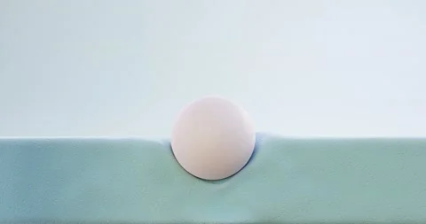 White ball drops presses composition, memory foam incision mattress Stock Footage 210809510