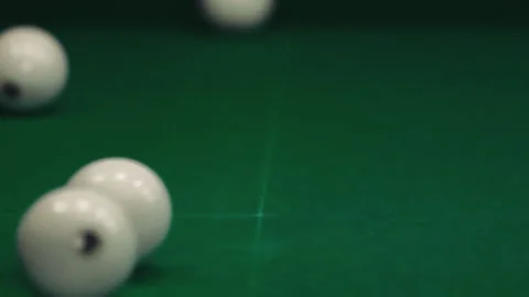 The white ball hits another. The balls fly in different directions Stock Footage 241710651