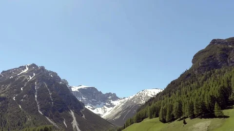 White balloon on the wind with the alps on the background Stock Footage 76864806