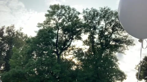 White balloon in the wind Stock Footage 139591845