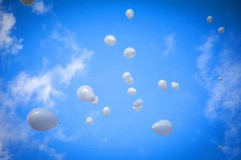White Balloons on Sky Background Stock Photos