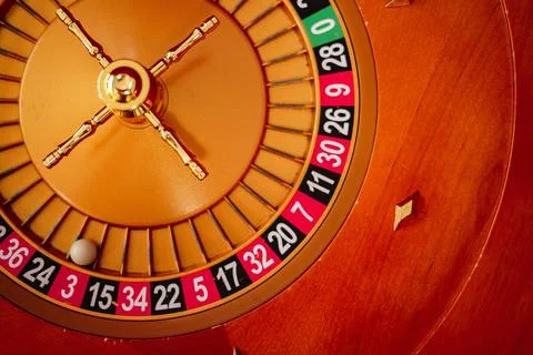 White balls and roulette Stock Photos