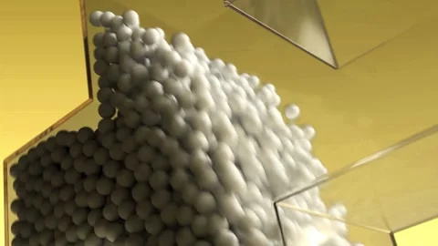 White balls flowing down clear plastic container creating dynamic motion Stock Footage 327594029