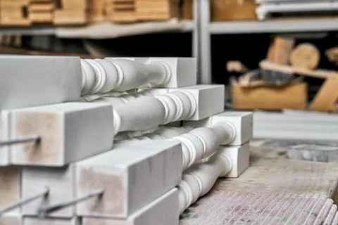 White balusters. Balusters process production. Solid wood balusters before Stock Photos