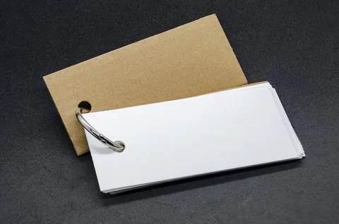 White banner shape notepad with customizable space for text on black backgr.. Stock Photos