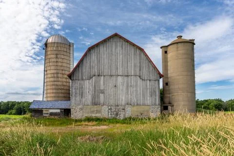White Barn with Two Silos Stock Photos