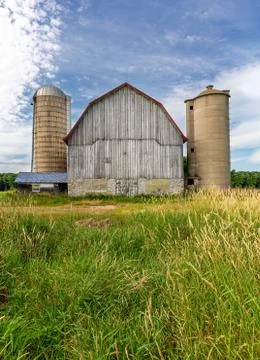 White Barn with Two Silos Stock Photos