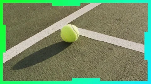 White bars appearing and teal border cropping while tennis ball settling, 스톡 동영상 333351372