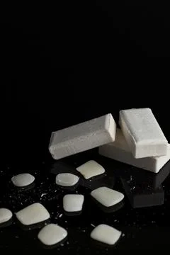 White bars of soap are stacked on top of each other with leftover soap Stock Photos