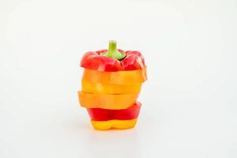 On a white base there is a paprika, composed of slices of pepper of differ... 스톡 사진