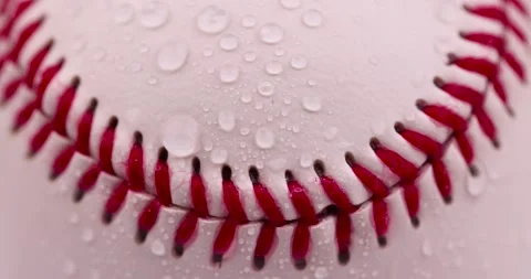 White baseball ball tied with red thread, a real round baseball ball close-up Stock Footage 267871673