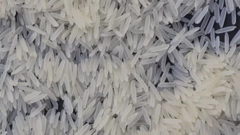 White basmati rice grains macro camera panning up handheld shot, FHD 스톡 동영상 342085893