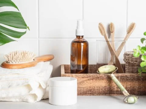 White bath background front view with cosmetics and accessories Stock Photos