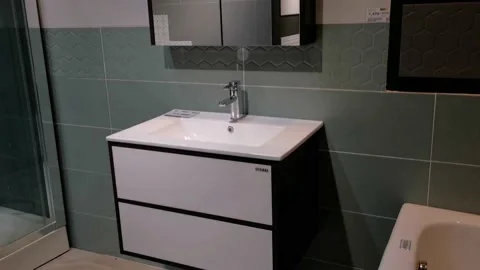 White Bathroom Cabinet with Ceramic Basin Stock Footage 159836645
