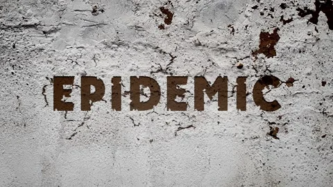 On a white, battered concrete wall appears the inscription: "epidemic" Stock Footage 124155815