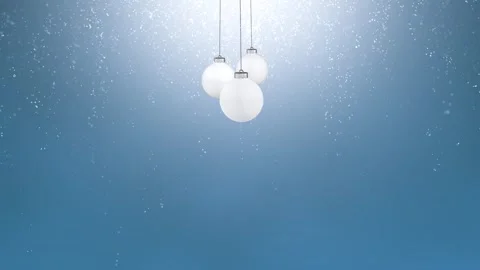 White baubles swinging on a string on blue background Stock Footage 339719581