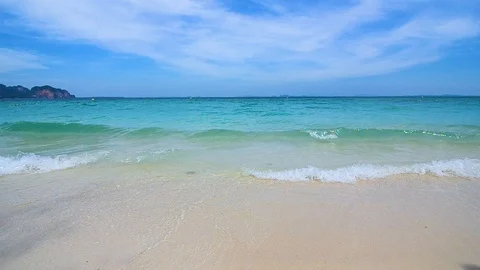 White beach on a clear blue sky, blue sea Stock Footage 103265210