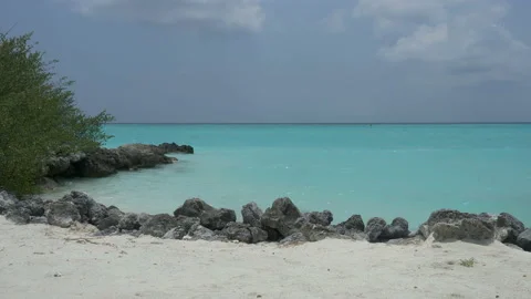 White beach with palm trees on the ocean and boat. Stock Footage 91115931
