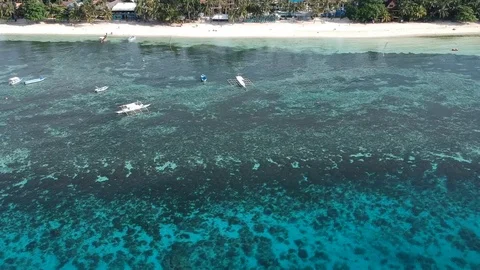 White beach resort with clear ocean water Stock Footage 113344692