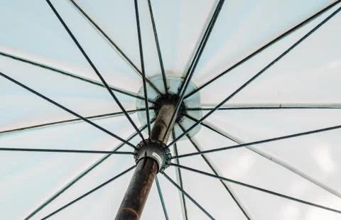 White beach umbrella Stock Photos