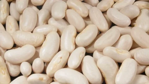 White beans close up. Macro. 4K video. Organic legumes. Видео 140813221