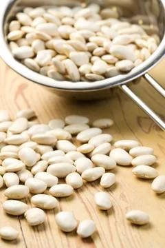 White beans in colander Stock Photos