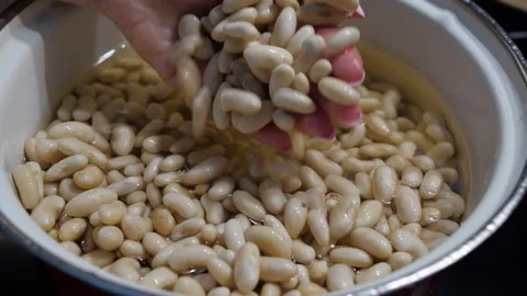 White beans in a pot of water Stock Footage 270491655