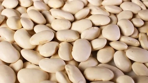 White beans raw bean rotating pattern macro texture background backdrop footage Stock Footage 91377884