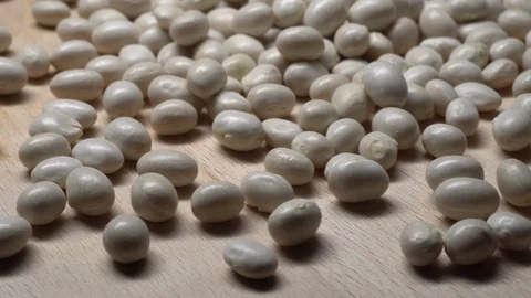 White beans in rotation. Close-up. Stock Footage 100820546