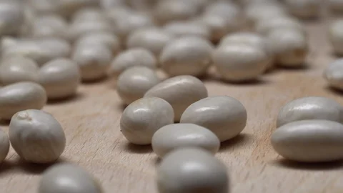 White beans in rotation. Close-up. Stock Footage 100820865