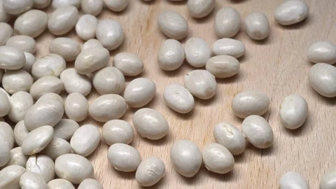 White beans in rotation. Close-up. Stock Footage 100821027