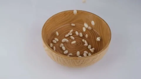 White beans slow motion Stock Footage 236447538
